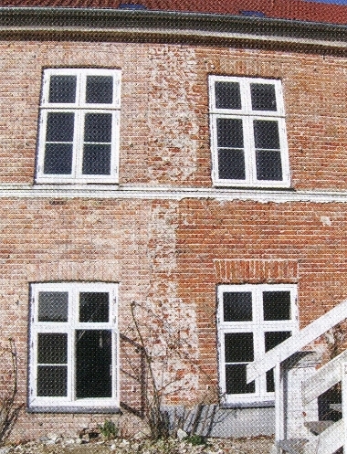 Udsnit af havefacaden under restaureringen historie_billed5.jpg